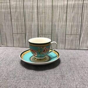 Grace’s Teacup Footed Cup and Saucer Set.